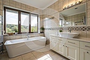 Tile bathroom interior design with bath and sink