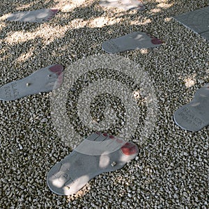 Tile in the form foot of person