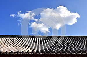 Tile and roof structure