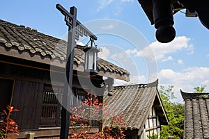 Tile-roofed dwelling buildings in Chinese traditional style on s