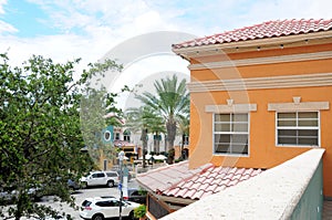 Tile roofs colorful office & store buildings, FL