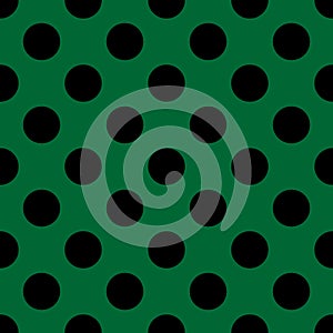 Tile vector pattern with big black polka dots on green background
