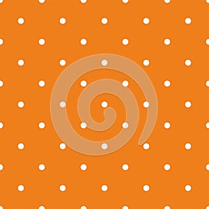 Tile vector pattern with small white polka dots on orange background