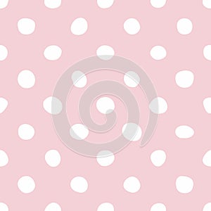 Tile vector pattern with white polka dots on pink background