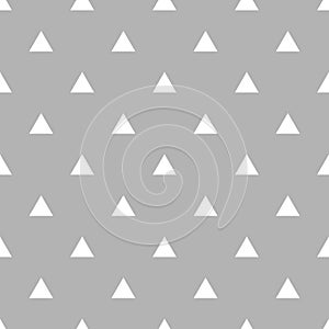 Tile vector pattern with white triangles on grey background