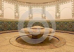 Tile and water faucets in the hammam of the Hassan II Mosque in Casablanca, Morocco.