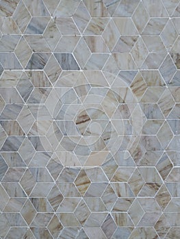 Tileable pattern of natural stone with hexagonal shapes as background.