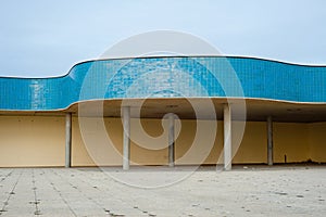 Tiled bathing resort structure on coastal promenade