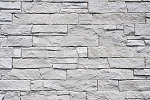 Tiled natural stone wall background - granite stone texture