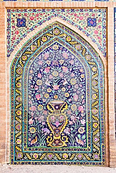Tiled oriental ornaments , Kashan, Iran photo