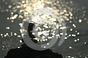 Tiled rocks with shimering light in backdround