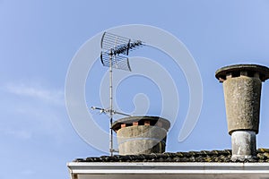 tiled roof chimneys antenna old equipment technology