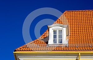 Tiled roof and one window