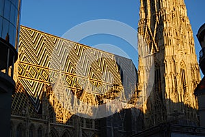 Tiled roof and South Tower of Vienna`s Stephansdom