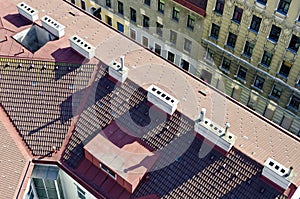 Tiled roof with white chimneys