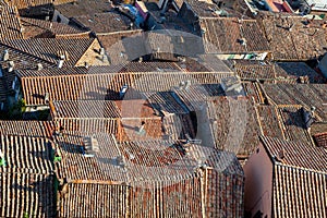 Tiled roofs and chimney pots of an ancient Italian town village. Soriano nel Cimino. Rooftop background photo
