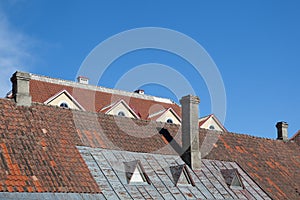 Tiled roofs with chimneys