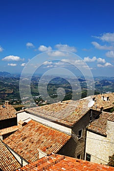 Tiled roofs and panorama.vid from the walls. San Marino photo