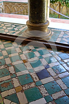 Tiled on the sill of a mullioned window in the Courtyard of the Maidens Patio de las Doncellas. Alcazar of Seville, Spain