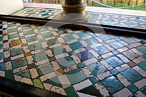 Tiled on the sill of a mullioned window in the Courtyard of the Maidens Patio de las Doncellas. Alcazar of Seville, Spain