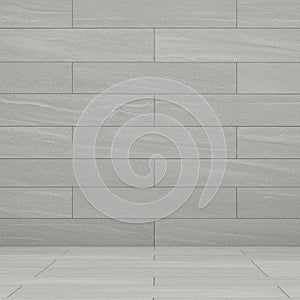 Tiled wall and floor featuring large rectangular tiles in a light gray color with a subtle