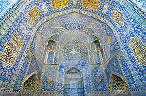 Tiled walls of ancient persian mosque of Iran.