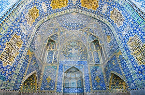 Tiled walls of ancient persian mosque of Iran. photo
