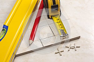 Tiler preparation for cutting tiles photo