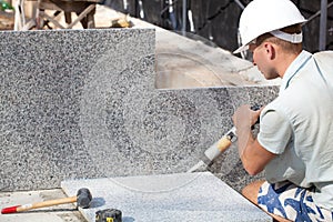 Tiler sealing joints between ceramic tiles