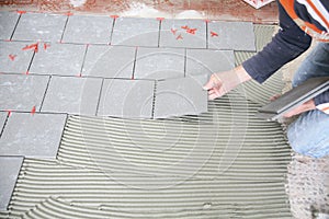 Tiler worker at work