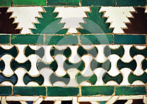 Tiles of Al Andalus Alcazar of Seville Spain. Arab pattern decoration photo