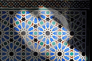 Tiles of Al Andalus. Alcazar of Seville Spain. Arab pattern decoration photo