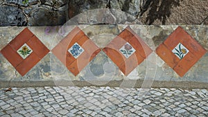 Tiles along a sidewalk of Volta Do Duche in Sintra in the Lisbon District of Portugal.