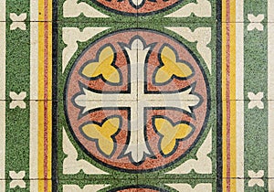 Tiles on the floor in an ancient form of a cross