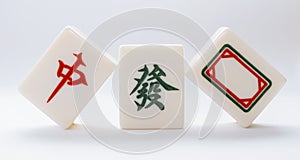 Tiles for mahjong. red, white, green.