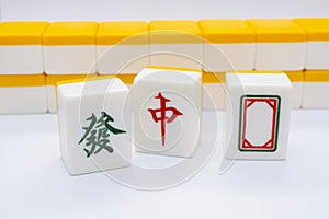 Tiles for mahjong. red, white, green.