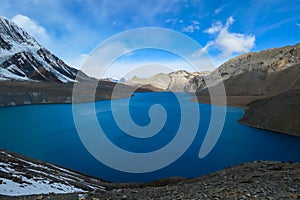 Tilicho Lake - A panoramic view on turquoise colored lake in Himalayas