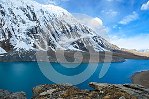 Tilicho Lake - A panoramic view on turquoise colored lake in Himalayas