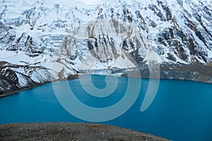 Tilicho Lake - A panoramic view on turquoise colored lake in Himalayas