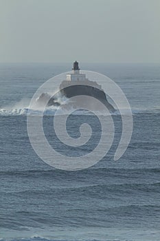 Tillamook Head Lighthouse On A Rock Island