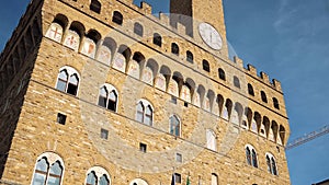 Tilt down of Palazzo Vecchio, Piazza della Signoria, Florence, Italy