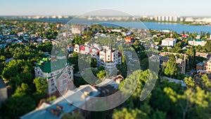 Tilt shift blurred city Voronezh, panoramic modern cityscape skyline in summer sunny day, aerial view