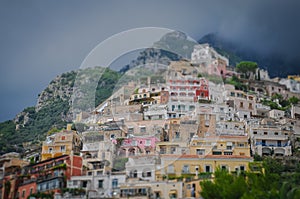 Tilt shift effect of Positano houses in a cloudy day