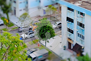 Tilt-shift lens photography miniature effect Aerial view of HDB heartland estate neighbourhood in Singapore selective focus