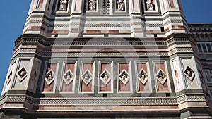 Tilt up of marble facade of Giotto bell tower, Cathedral of Saint Mary of the Flower, Florence, Italy
