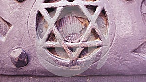 Tilt-up to door with Star Magen or Shield of David Judaism symbol