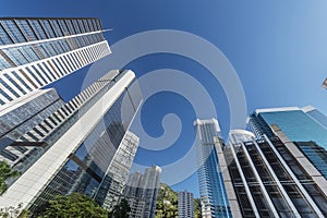 Tilt view of high rise office building in Hong Kong city