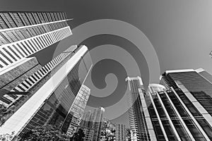 Tilt view of high rise office building in Hong Kong city