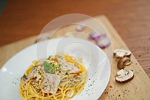 Tilted top view of spaghetti carbonara lunch dinner meal
