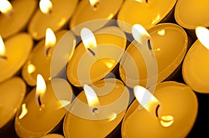 A tilted view of tealight candles